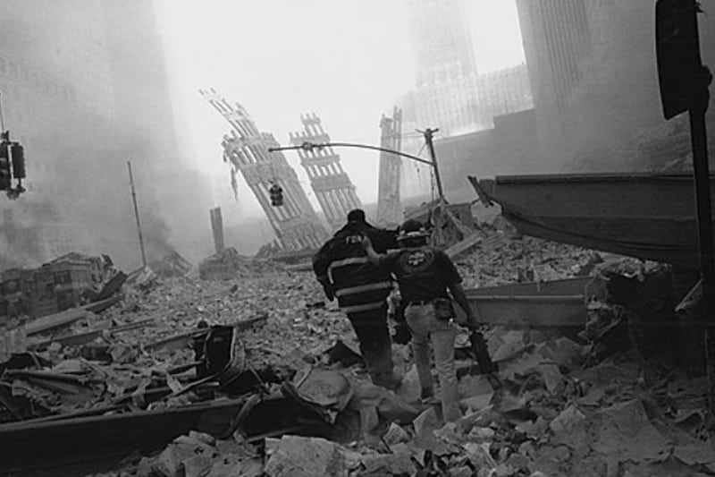 A NewYork-Presbyterian paramedic, John Bergman, at the site with a firefighter.