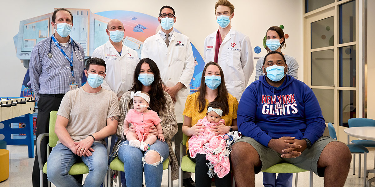 The Skaats and Civil families with members of their care teams.