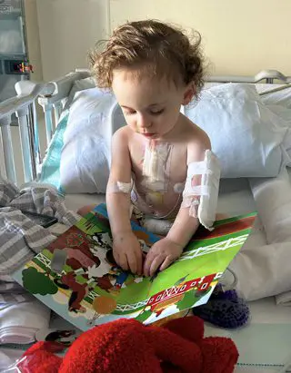 John underwent open-heart surgery at just six days old