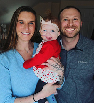 Ashley and Brian Cotter with their daughter Ruby post-transplant.
