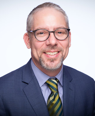 Dr. Christopher Petit