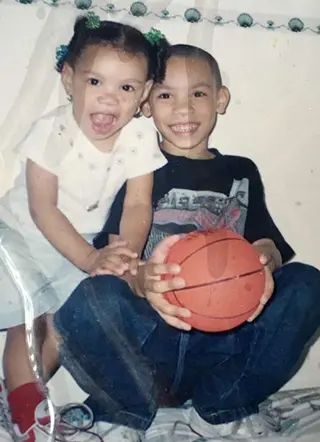 Raymond with his little sister, Adrianna.