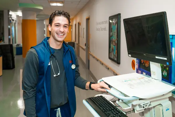 Daniel Paparelli, RN in hallway of hospital