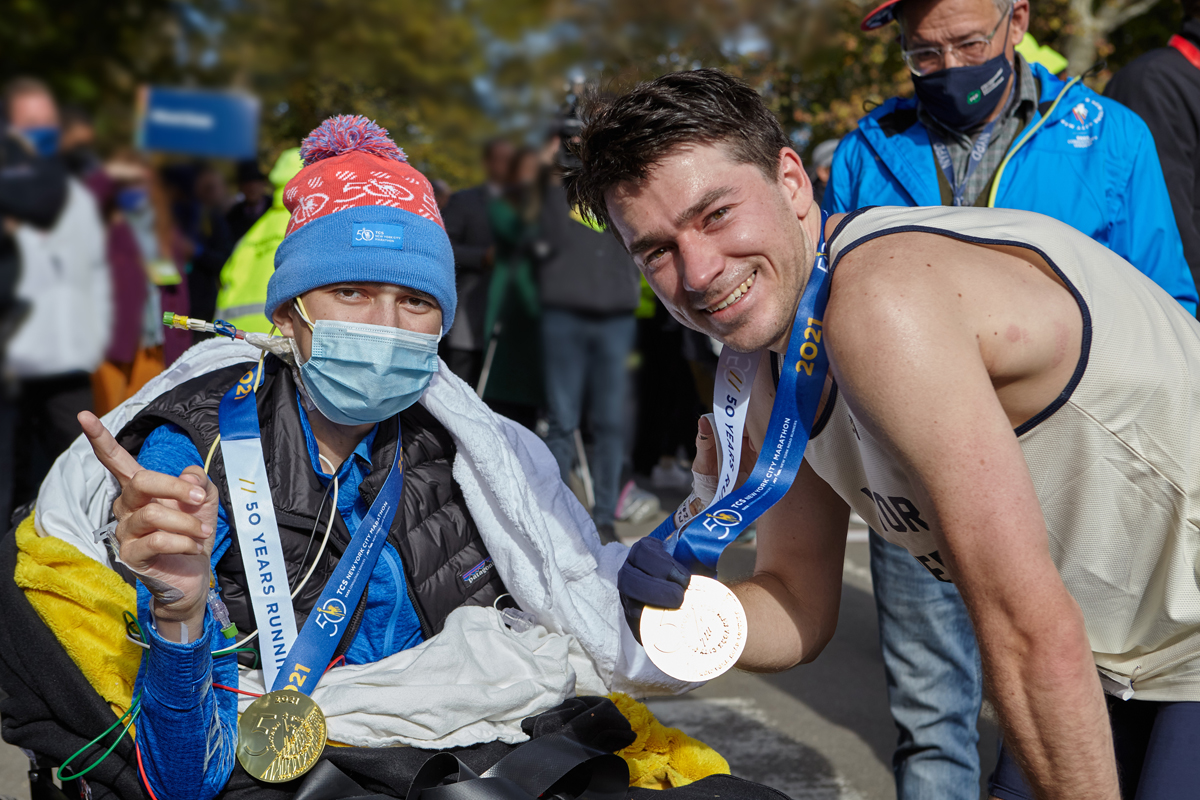 Mark and David both wearing medals