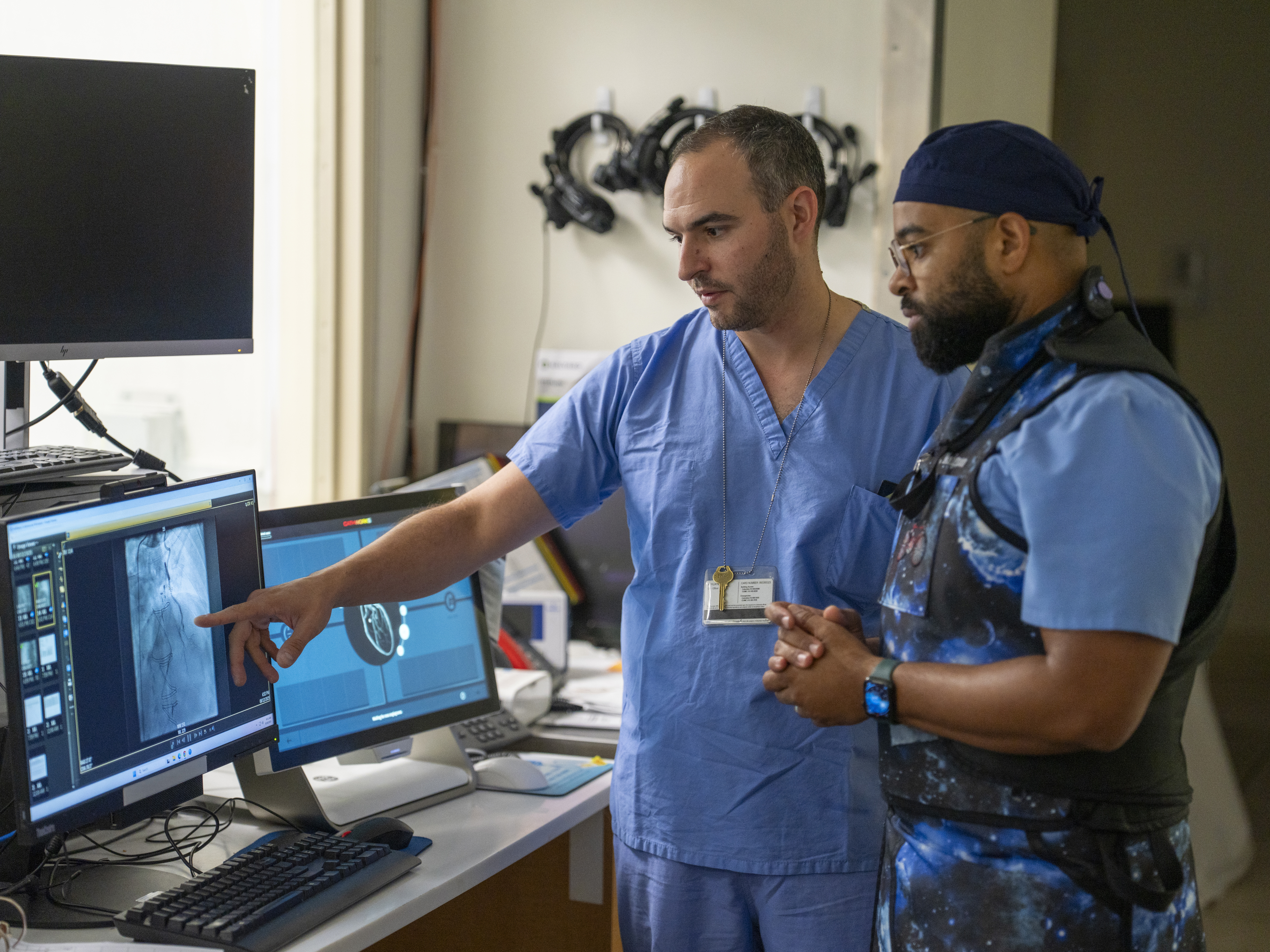 Researchers reviewing a medical scan