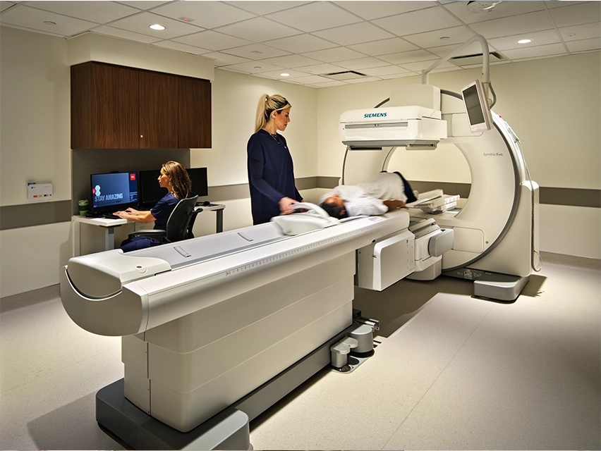 Nurses taking an MRI of a patient.