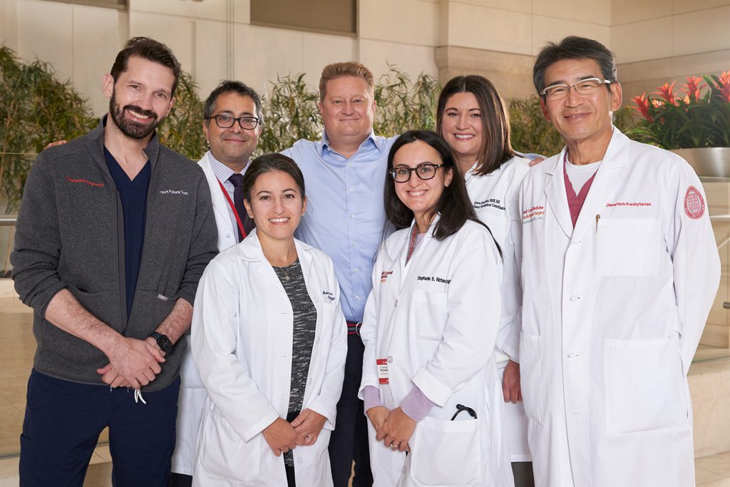 Mati with members of his care team