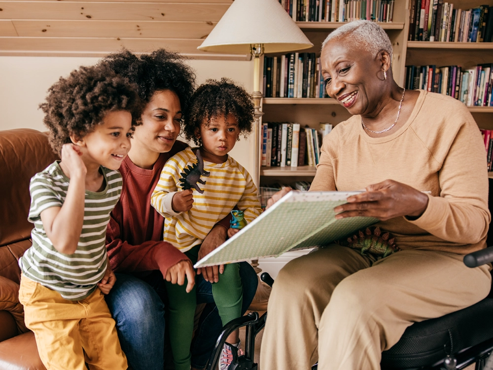 Grandma reading to her grandchildren