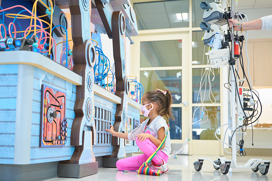 child playing in Star Wars–themed playspace.