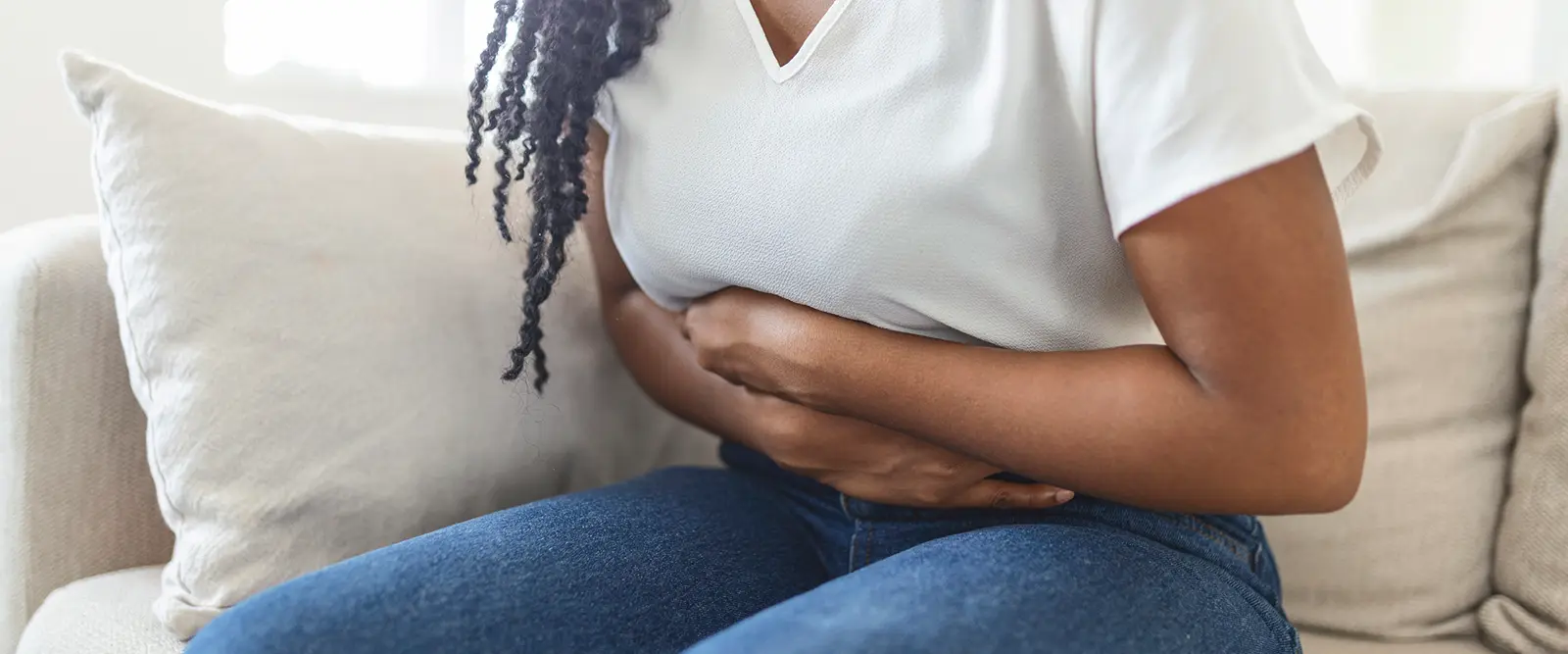 Woman having stomach pains