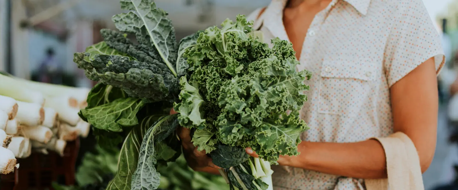 Woman holding kale