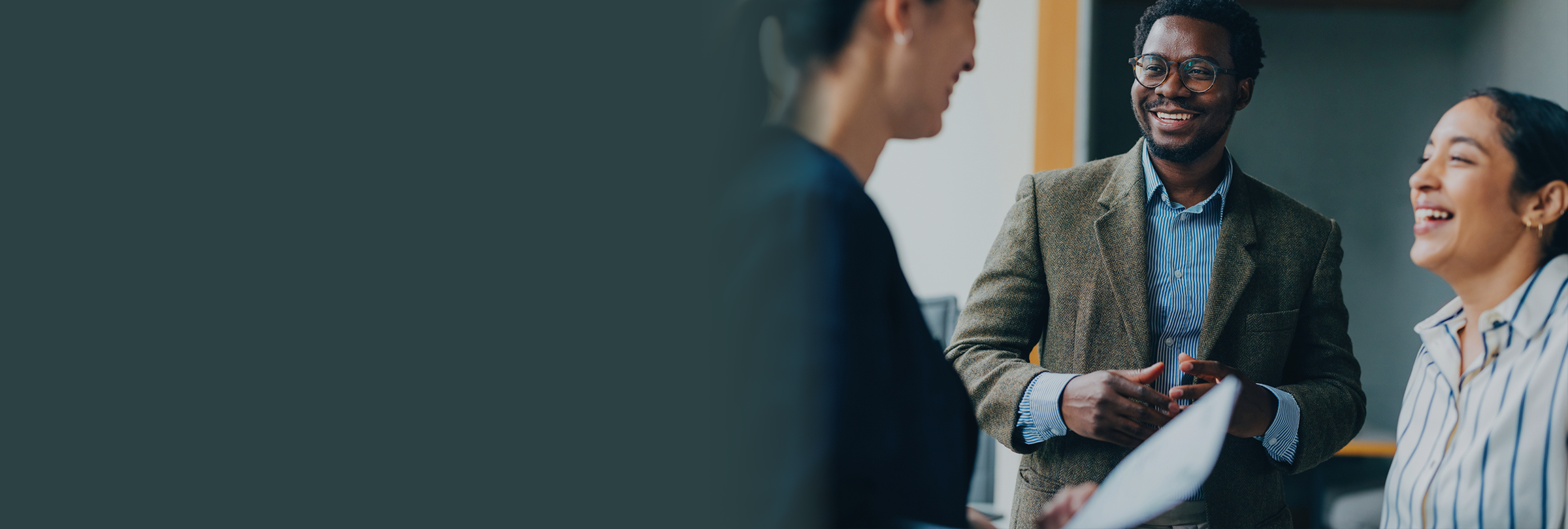 Volunteers holding eachother in a circle