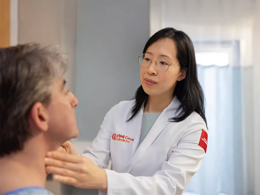 Dr. Ma with a patient