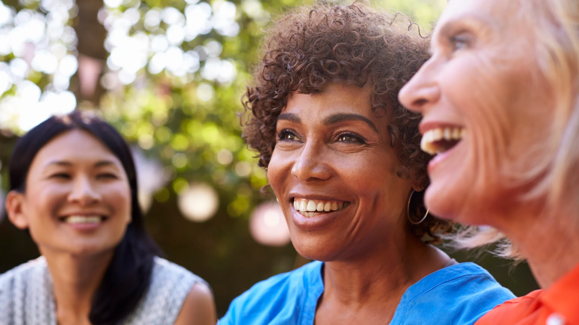 A group of women smiling.