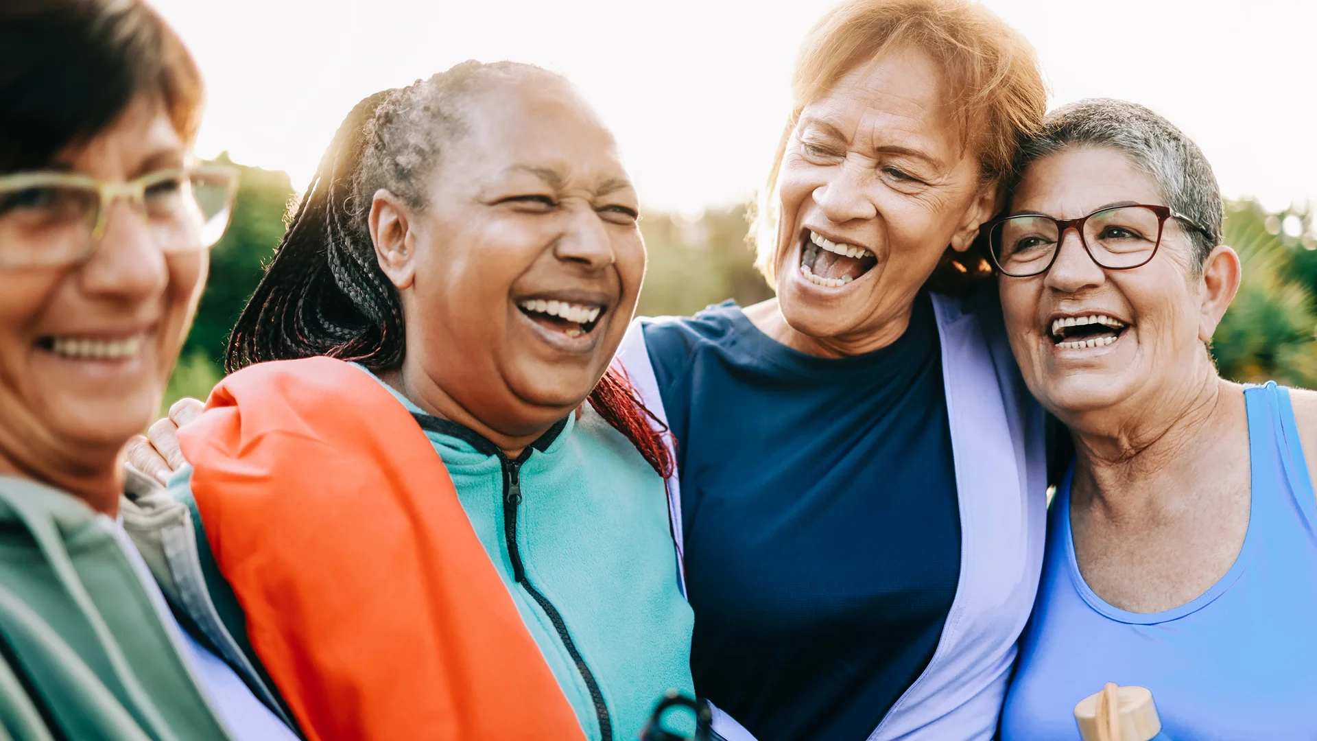 A group of older women smiling.