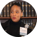 WOman speaking at microphone