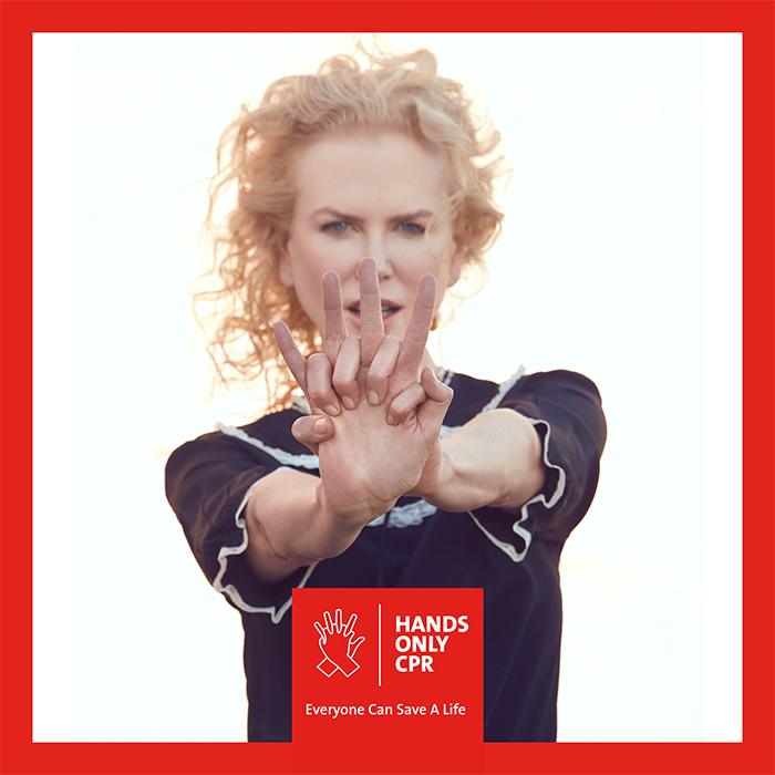 Nicole Kidman demonstrating hands-only CPR