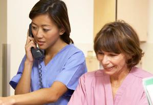 stock image of nurse talking on the phone