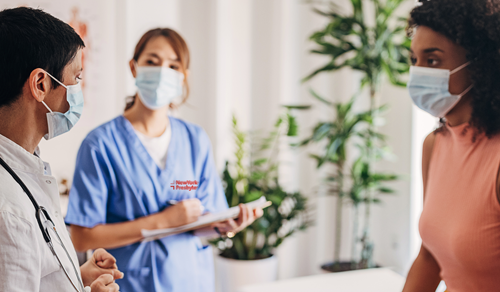 Image of NYP worker with patient