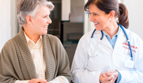 Elderly female patient with female clinician