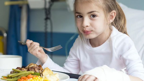 Image of NYP nurse with a male patient